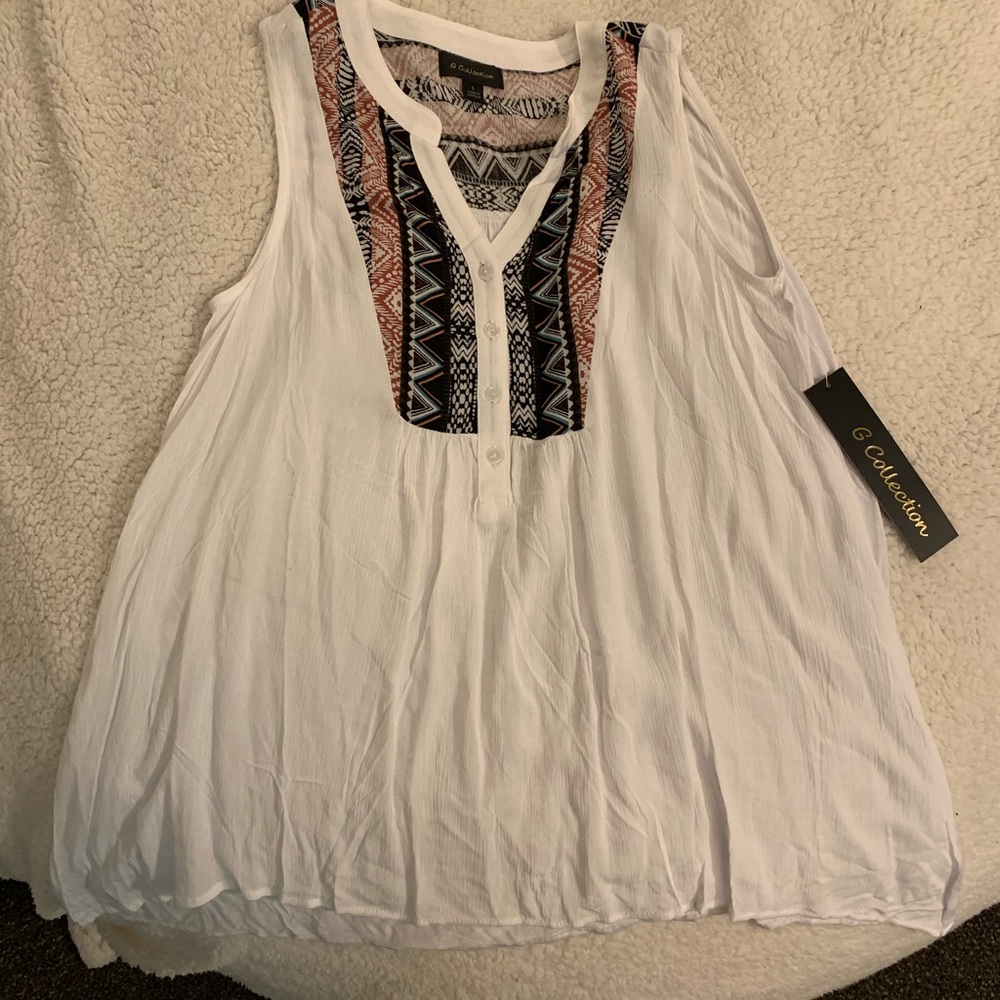 White sleeveless blouse